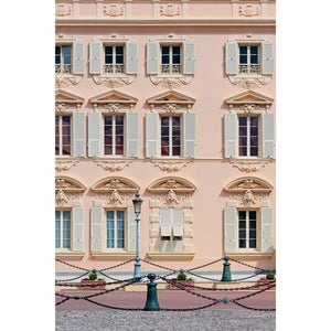 Pink building facade with decorative elements and shutters | Monaco